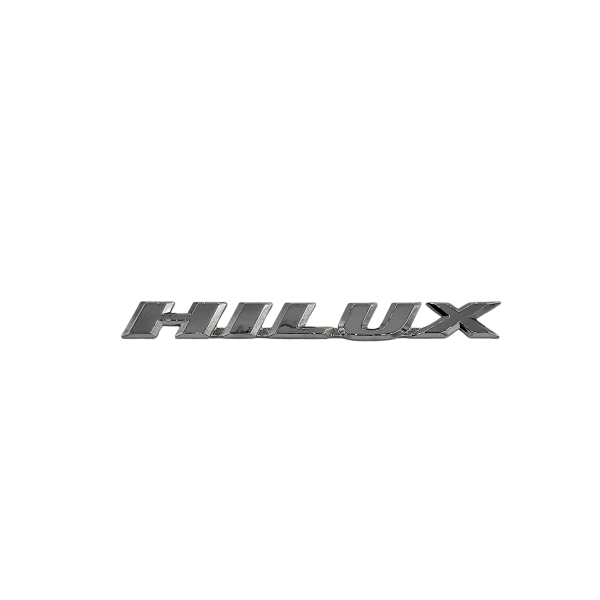 EMBLEMA TOYOTA "HILUX" LINEA 3.0 2002-2004 ORIGINAL - Imagen 1