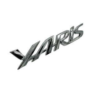 EMBLEMA PORTON "YARIS" YARIS 2019-2024 ORIGINAL