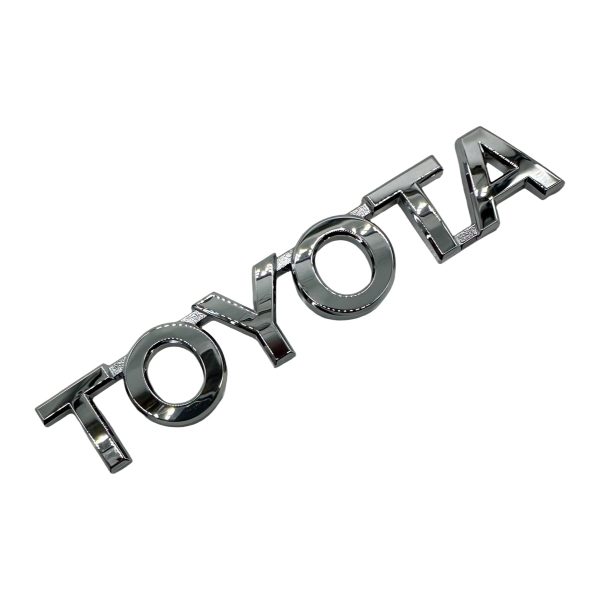 EMBLEMA PORTON "TOYOTA" YARIS 2019-2024 - Imagen 1