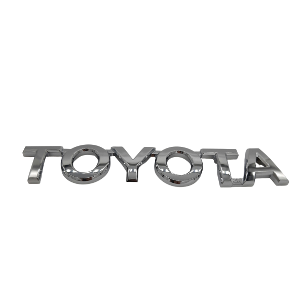 EMBLEMA "TOYOTA" COROLLA 2002-2008 VA EN BAUL - Imagen 1