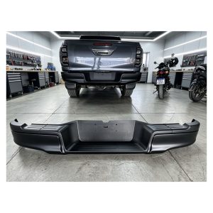 PARAGOLPE TRASERO HILUX 2016-2026 C/SOPORTES *NEGRO* FPI TAILANDIA