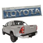 EMBLEMA "TOYOTA" PORTON HILUX 2016-2025 REVO SPT